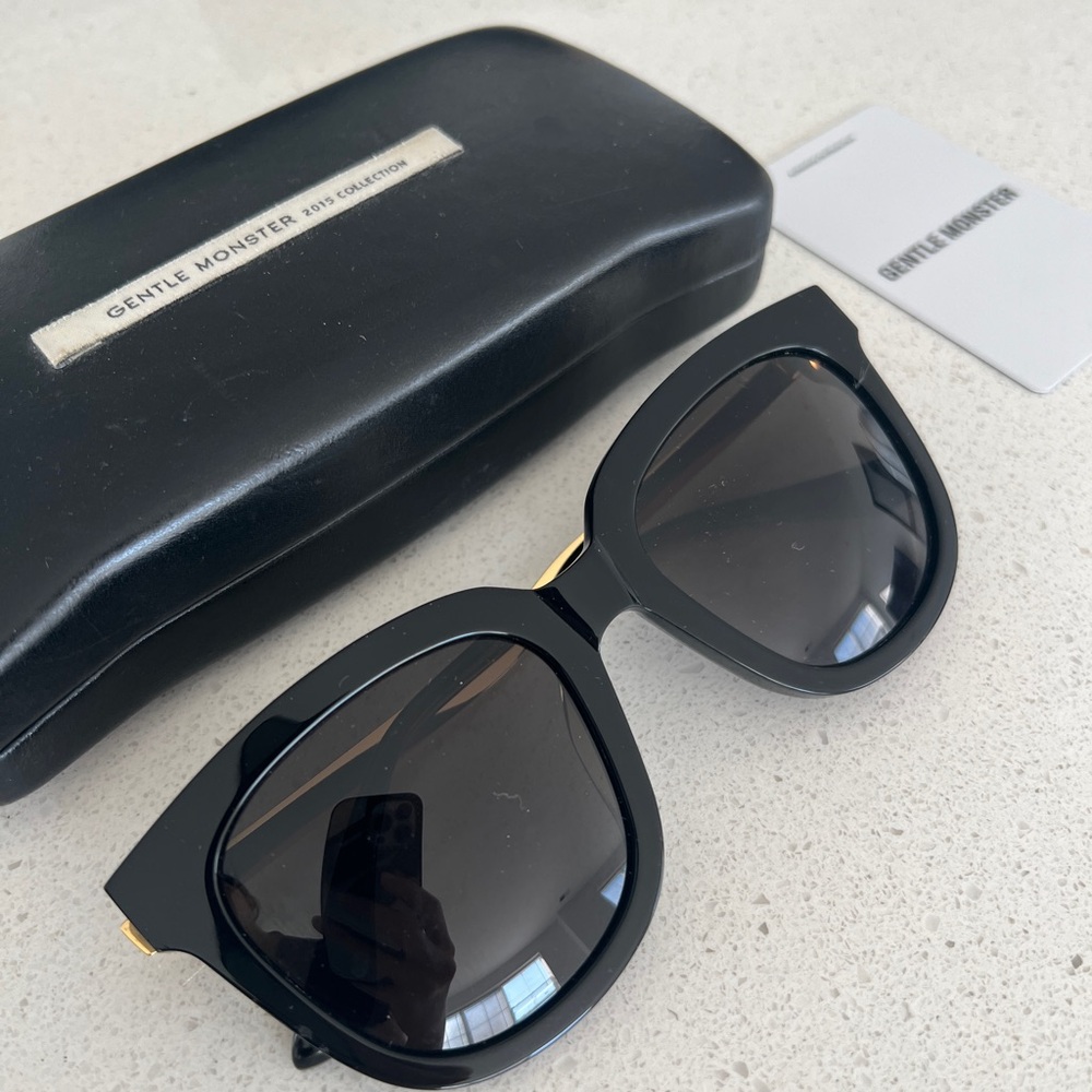Gentle Monster Black and Gold Sunglasses